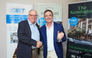 David Chandler OAM handing over the iCIRT award to Allan Vidor from Toga Group